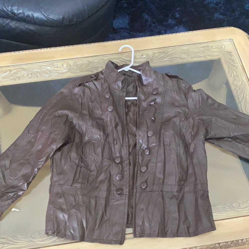 Brown leather jacket.